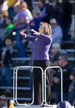 Mrs. Kitts directing the Marching Pride of North Alabama